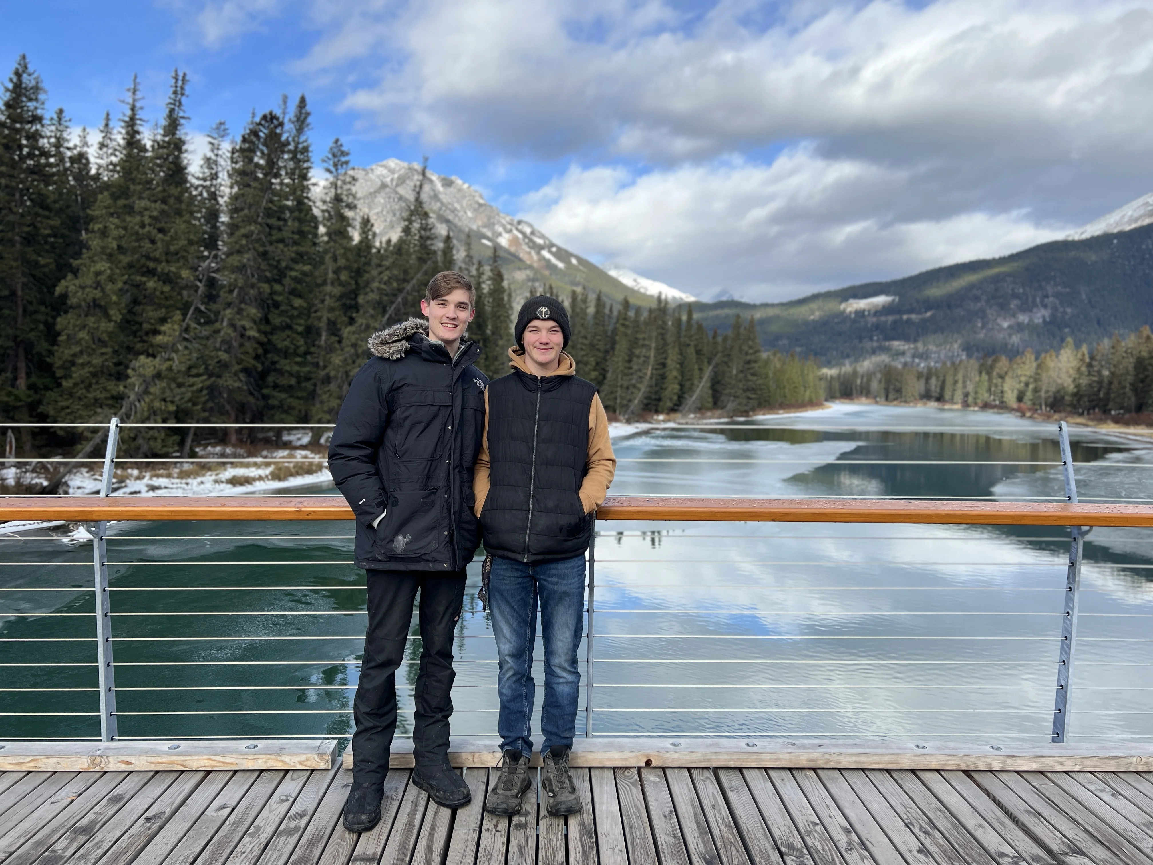 Ryan and Aiden standing together at Banff