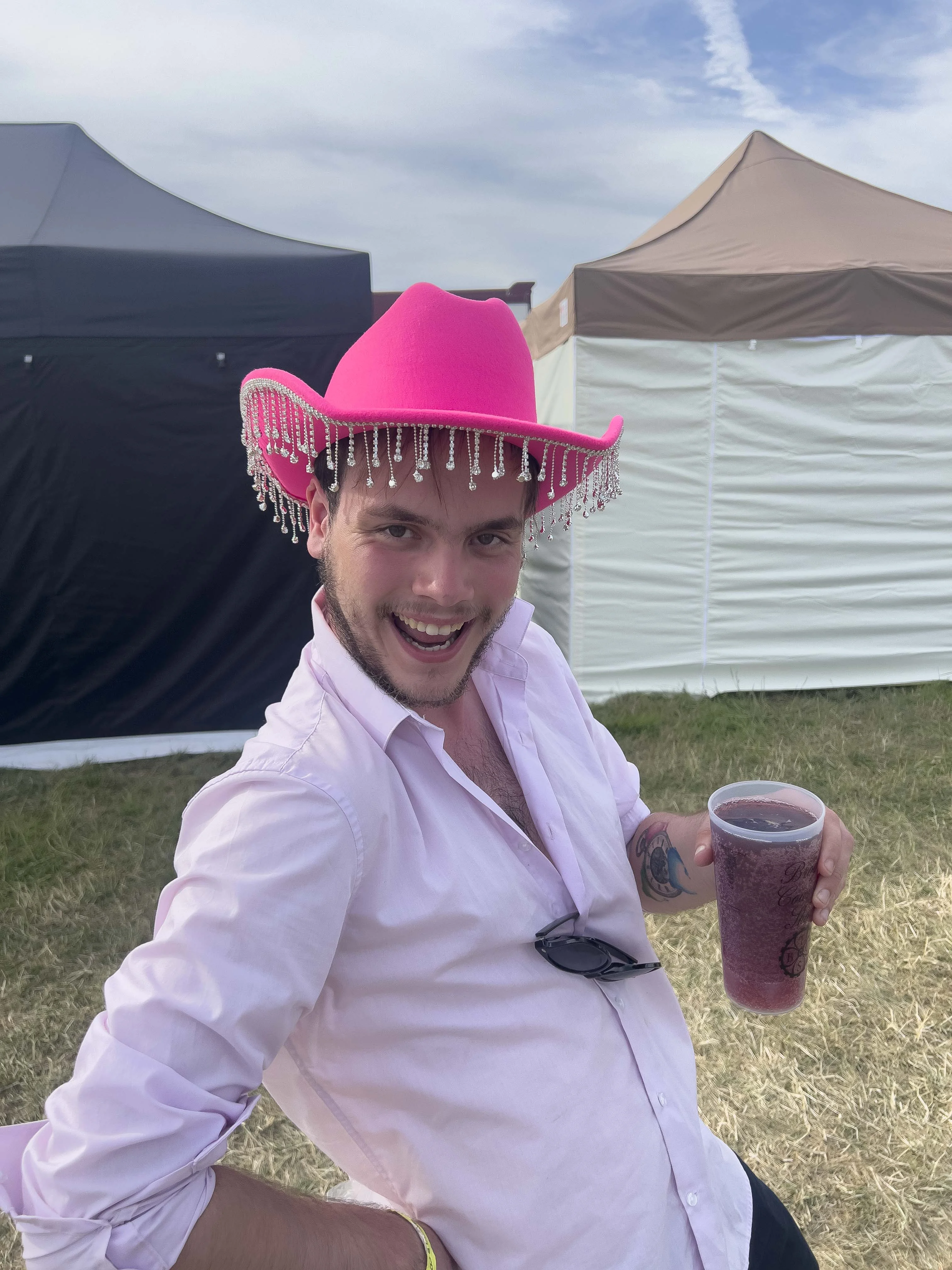 Korben with his pink cowboy hat and cider in hand