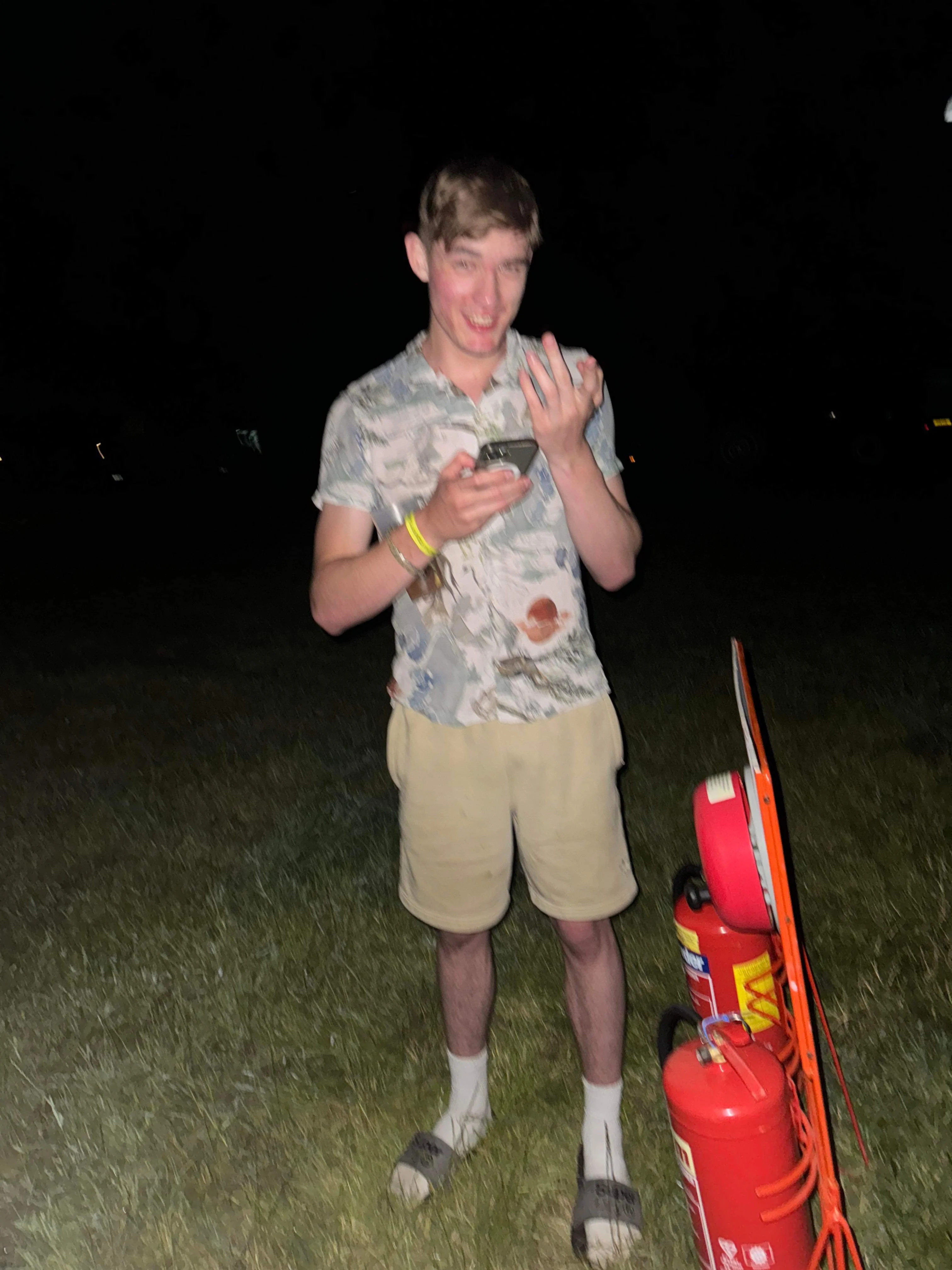 Ryan laughing at the fire sign