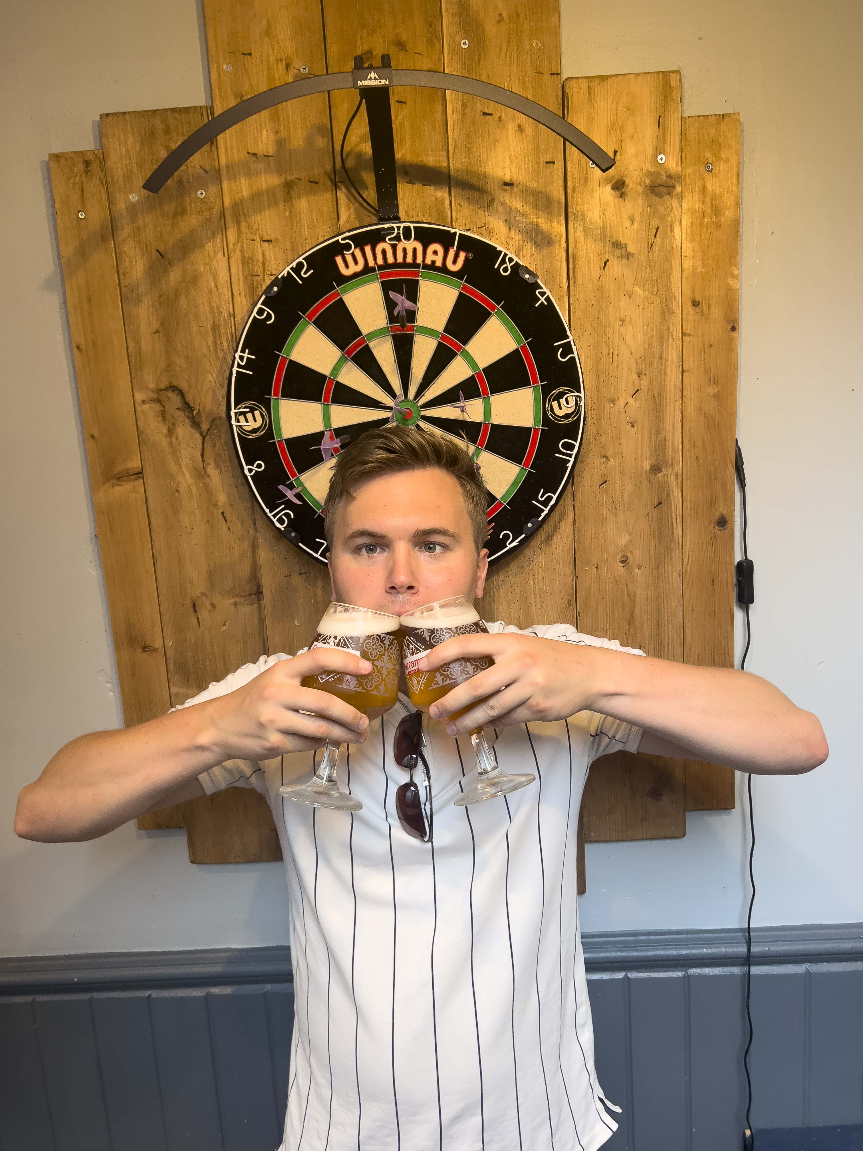 JJ enjoying some pints and darts