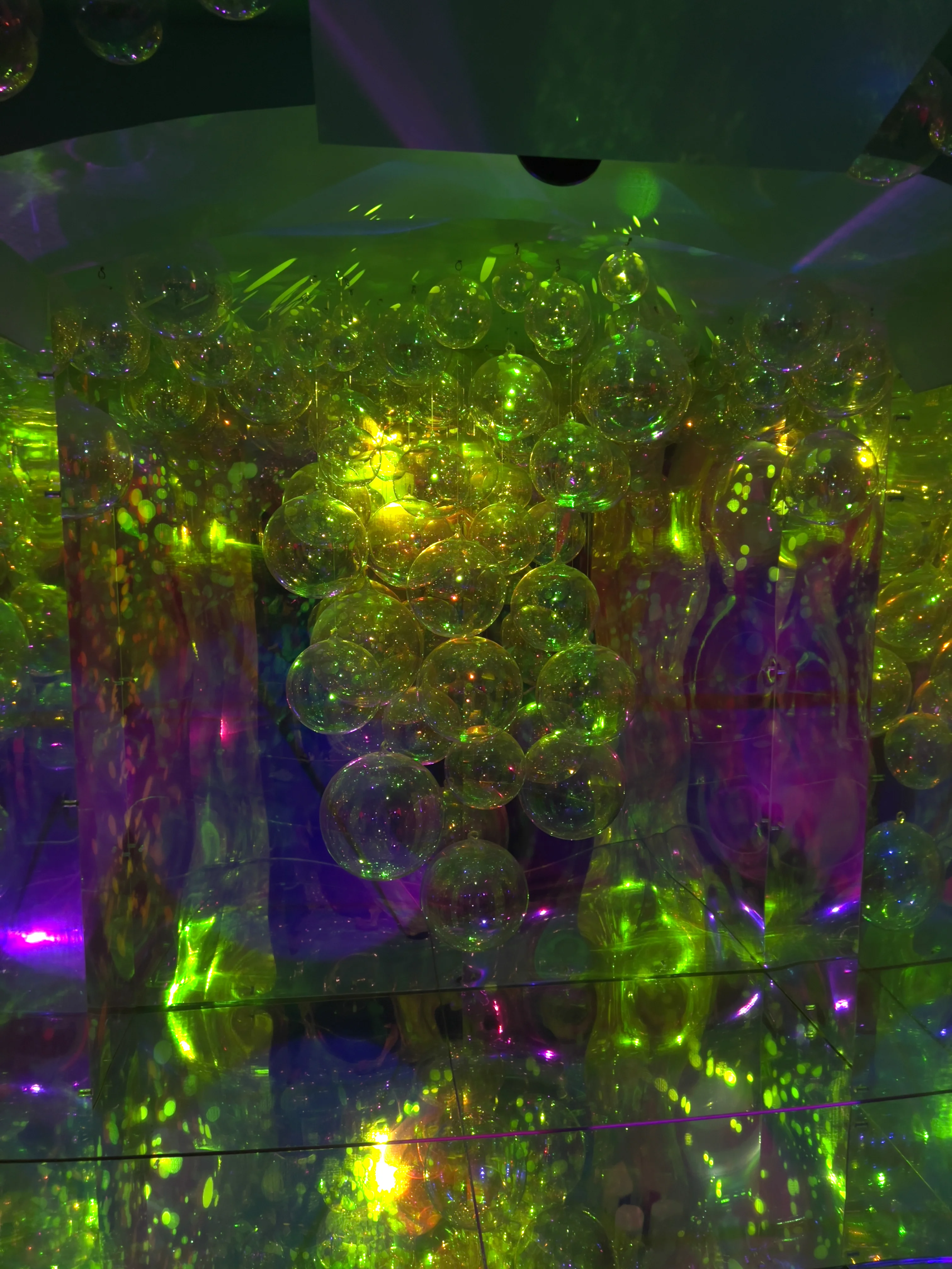 Immersive mirrored room installation at the Moco Museum